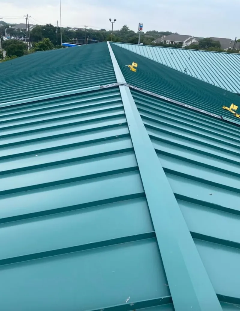 Green commercial metal roof ridge and valley for Metal Roof Repair in Shaw Heights